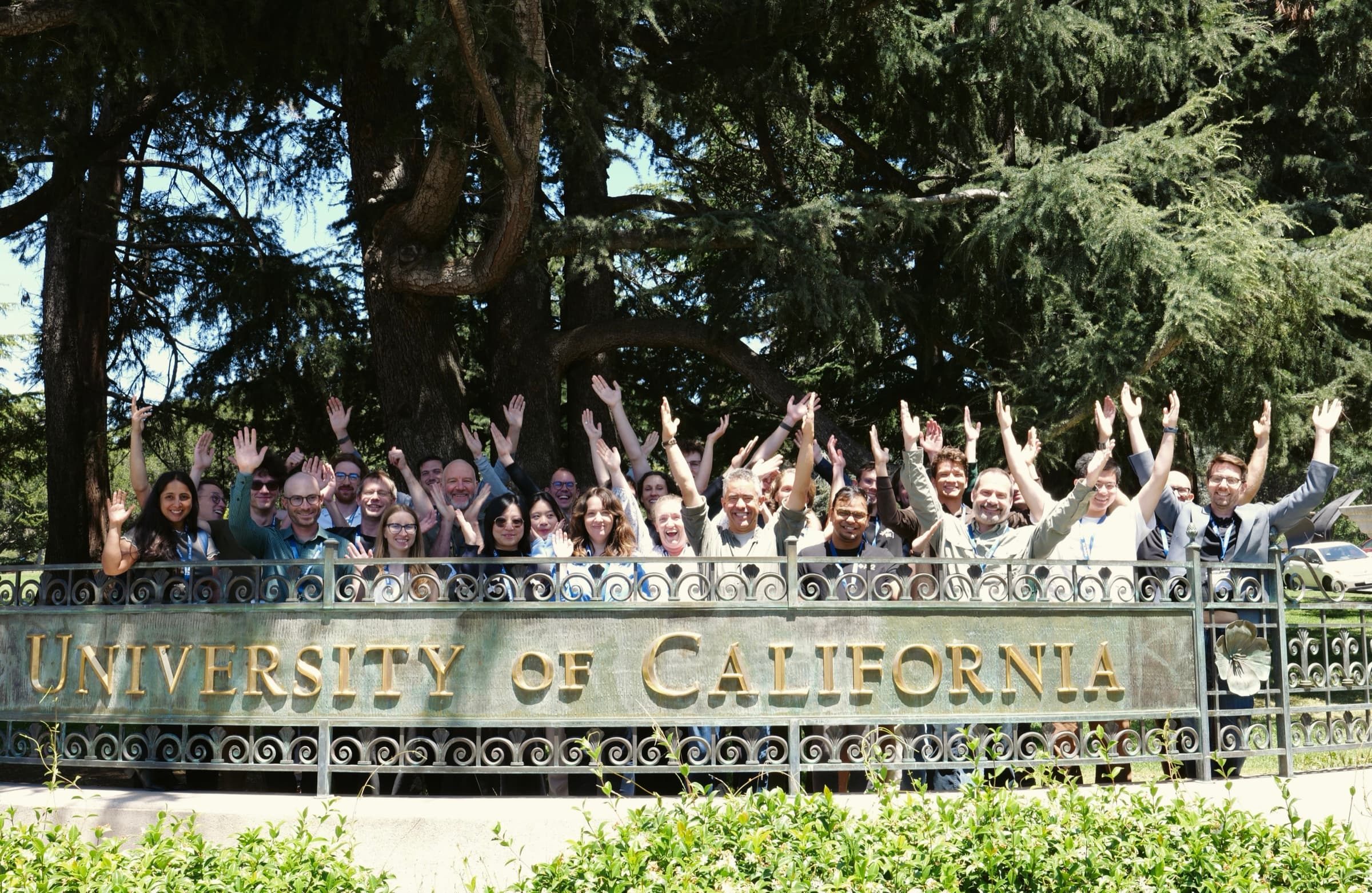 Participants in the first AAI4Science Developer Summit gathered behind the University of California sign